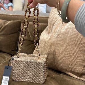 La Regale Tan Woven Mini Bag with Tortoise Chain